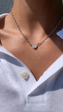 ILLUSION SET ROUND SOLITAIRE ON OVAL LINK CHAIN