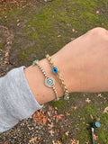 DIAMOND AND BLUE TOPAZ EYE BRACELET
