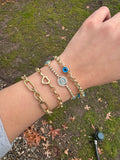 DIAMOND AND BLUE TOPAZ EYE BRACELET